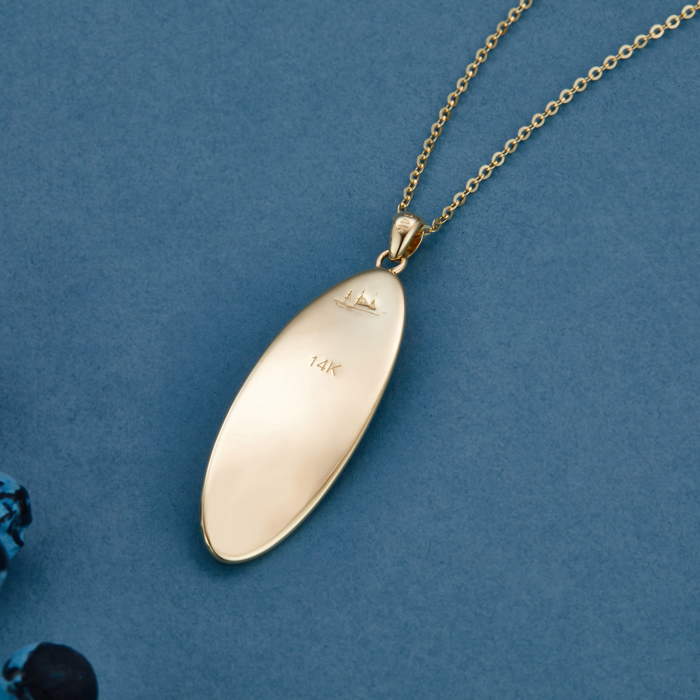 Emigration ship engraved on the back of the Ring of Kerry 14K gold oval pendant
